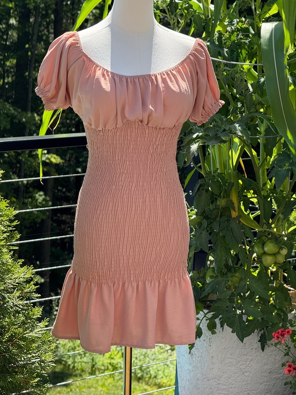 Smocked light rose mini dress